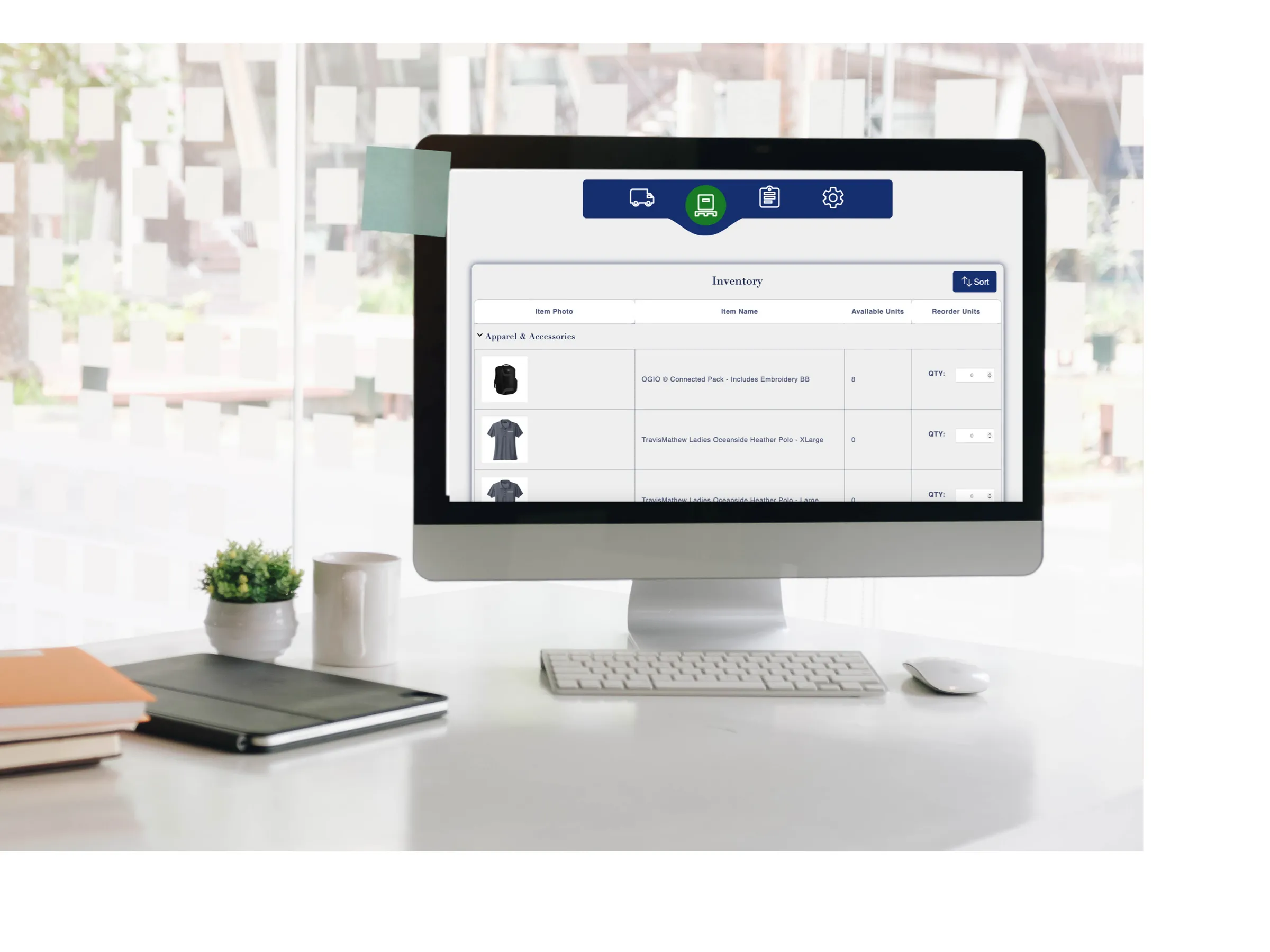 Desktop monitor showing the Lavish client dashboard with inventory and order data